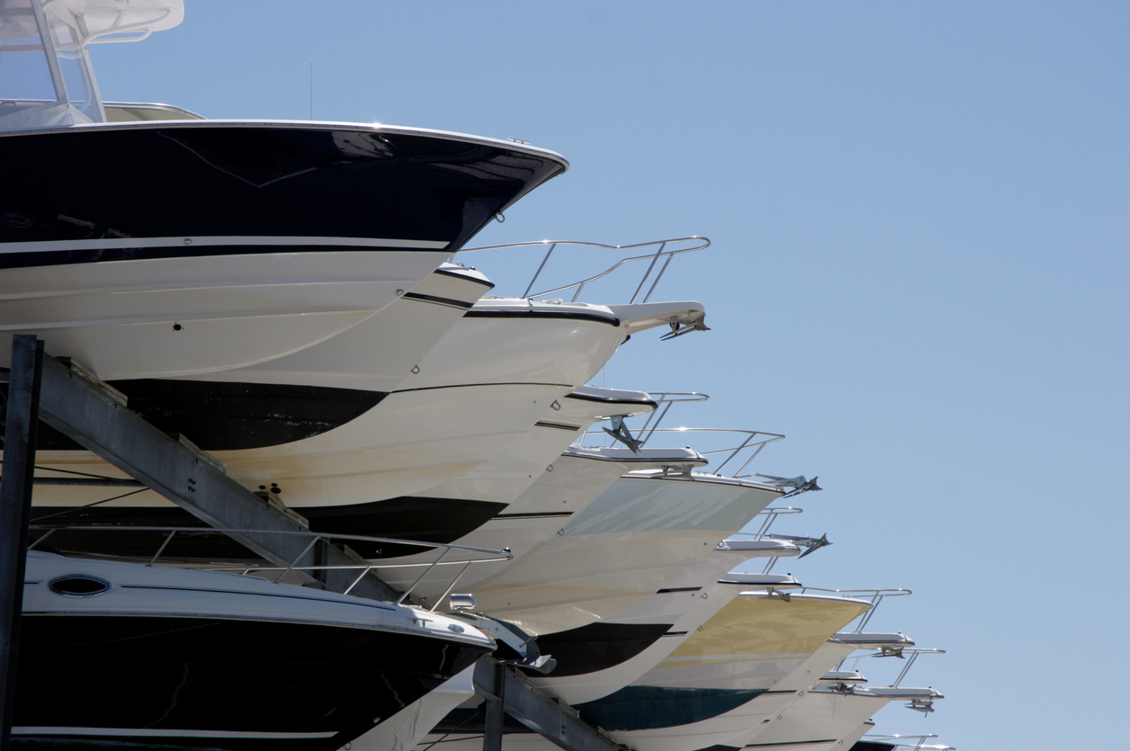 Recreational Boats stored up in shelves in wait for the seasons action.